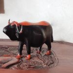 Wooden hand curved Buffalo